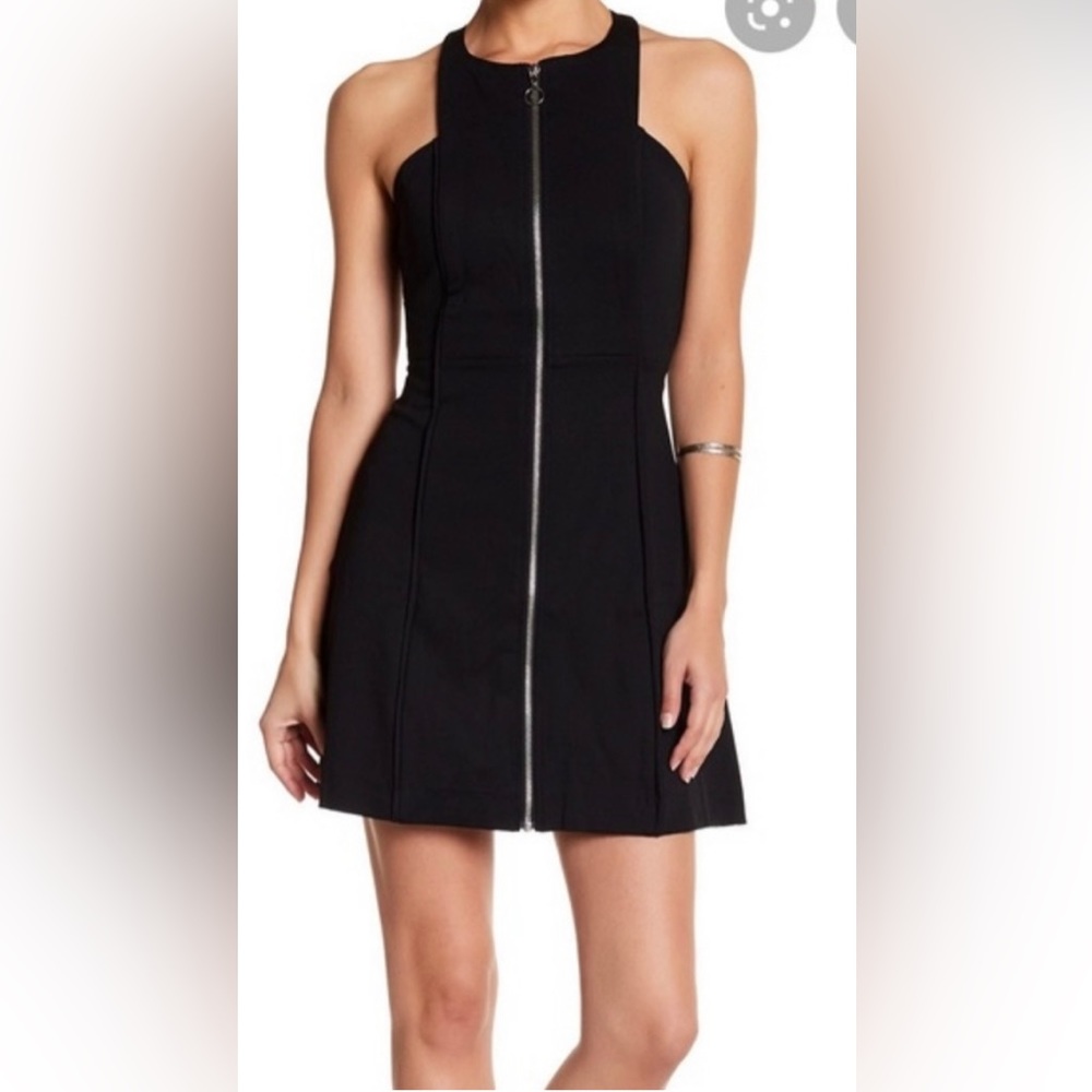FREE PEOPLE BLACK MINI DRESS .